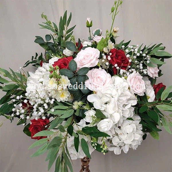 white hydrangea and pink rose centerpieces