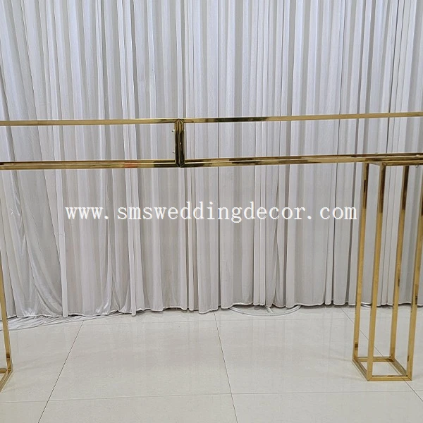gold metal stands for centerpieces